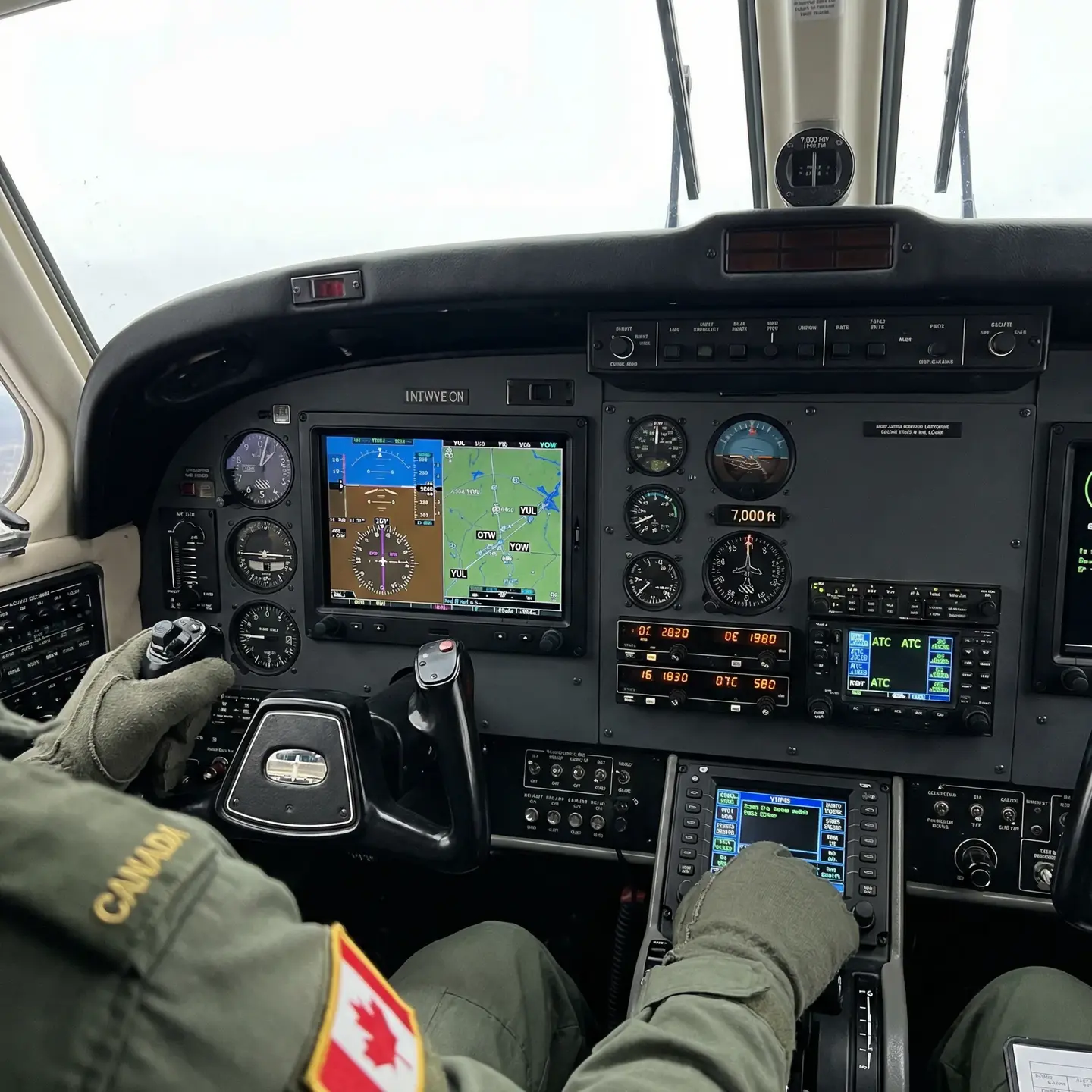 IFR pilot in action cockpit controls